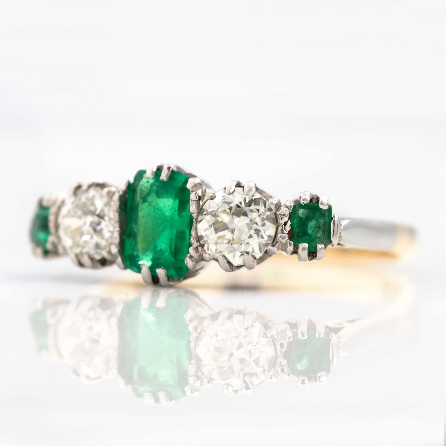 Art Deco Platinum Emerald and Diamond Five Stone Ring