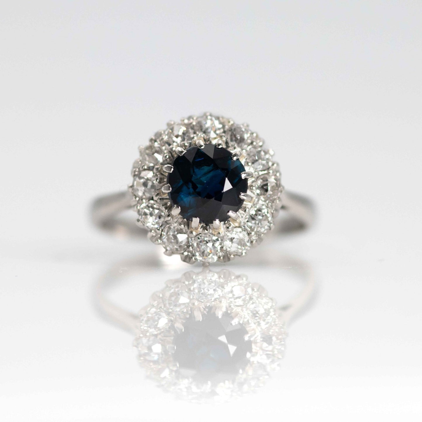 Elegant Platinum 1.10 carat Sapphire and Diamond Cluster Ring - Friar House