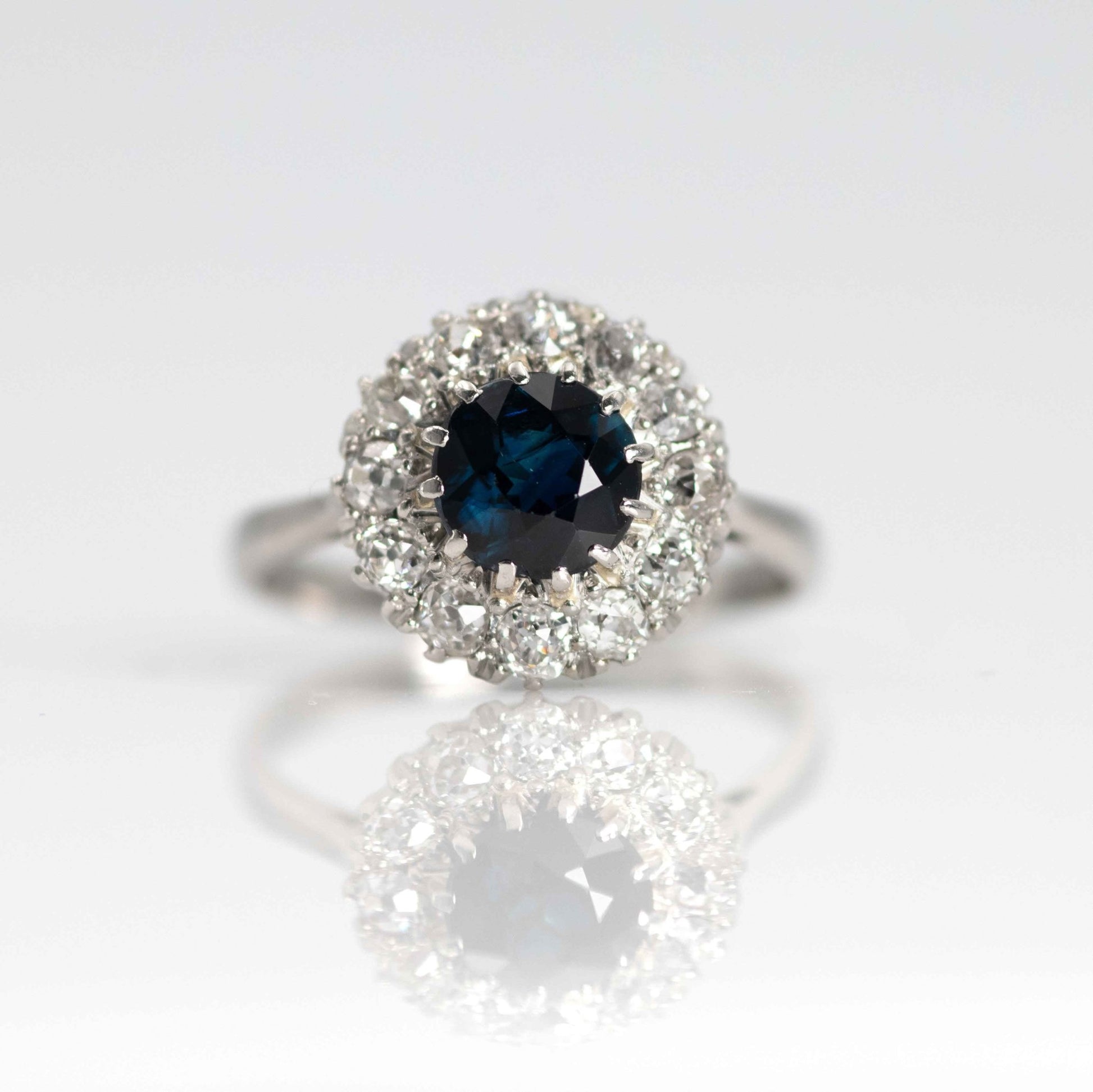 Elegant Platinum 1.10 carat Sapphire and Diamond Cluster Ring - Friar House