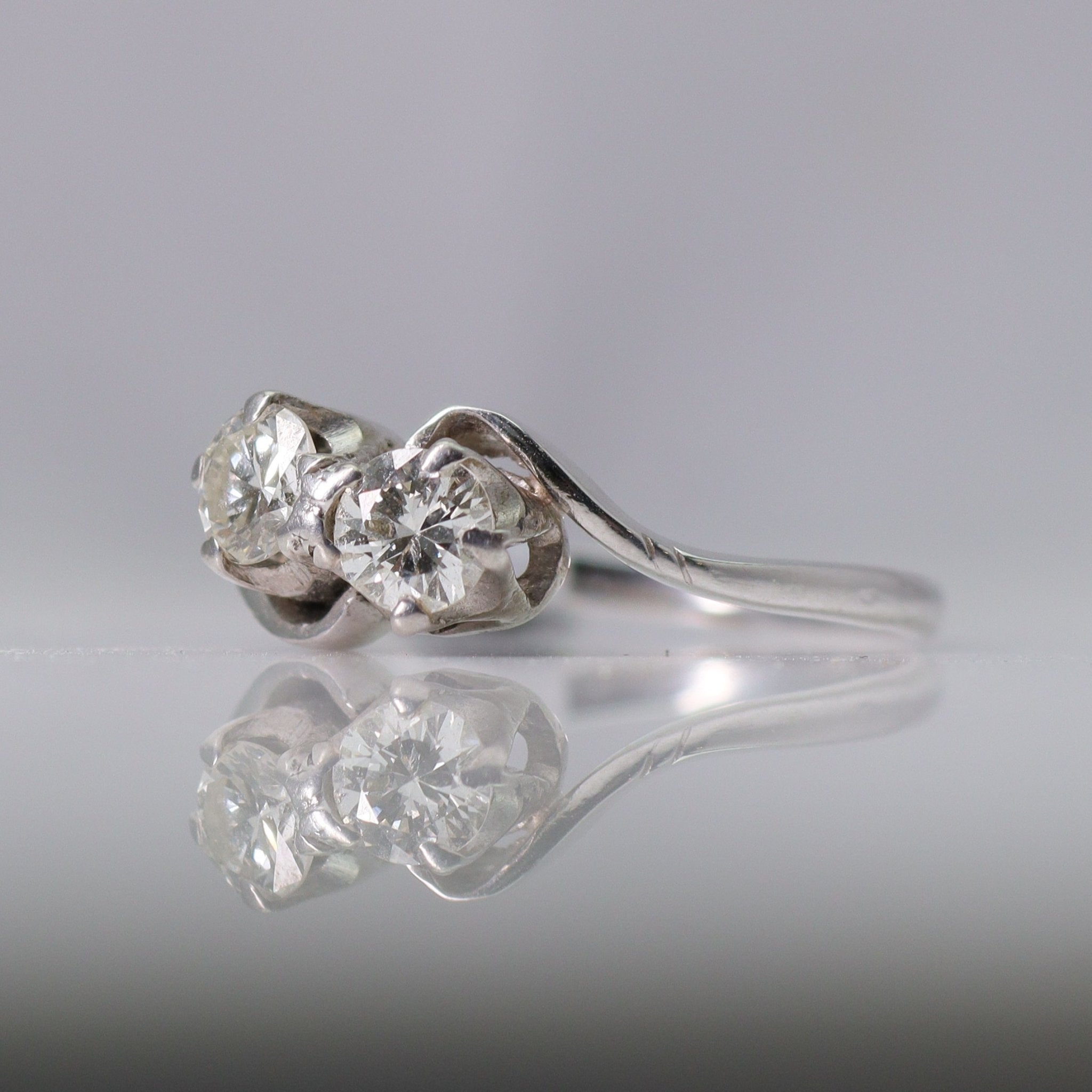 Two diamond twist engagement on sale rings